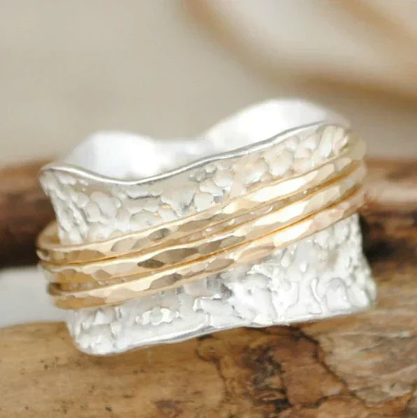 Anillo giratorio vintage fino en oro y plata